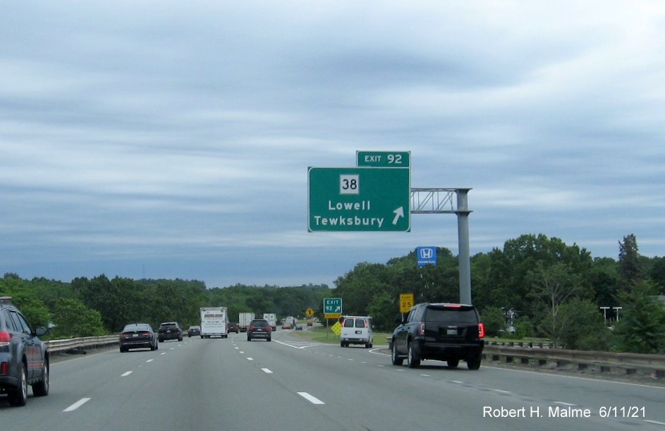 Image of overhead ramp sign for MA 38 exit with new milepost based exit number on I-495 North in Tewksbury, June 2021