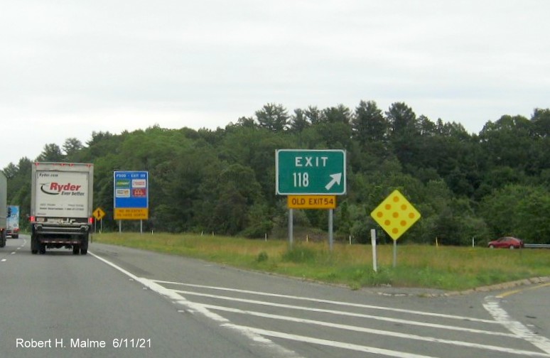 Image of gore sign for MA 150 exit with new milepost based exit number and yellow Old Exit 54 sign attached below on I-495 North in Amesbury, June 2021