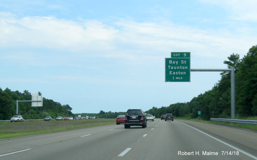 Image of recently placed 1-mile advance overhead for Bay Street exit on I-495 South in Norton in July 2018