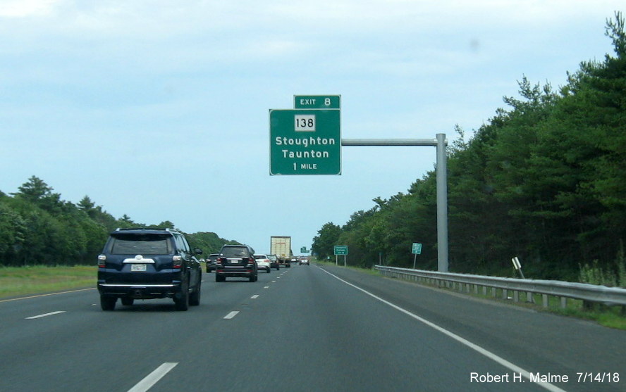 Image of recently placed 1-mile advance overhead sign for MA 138 exit on I-495 South in Raynham in July 2018