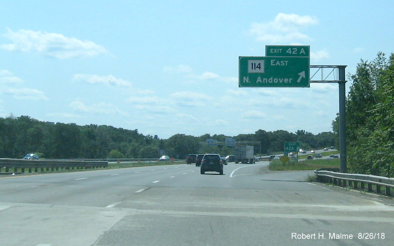 Image of overhead off-ramp sign for MA 114 East exit on I-495 South in Lawrence