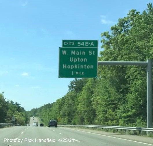Image of 1 mile advance overhead sign for West Main Street exits with new milepost based exit numbers on I-495 South in Hopkinton, by Rick Handfield, May 2021 