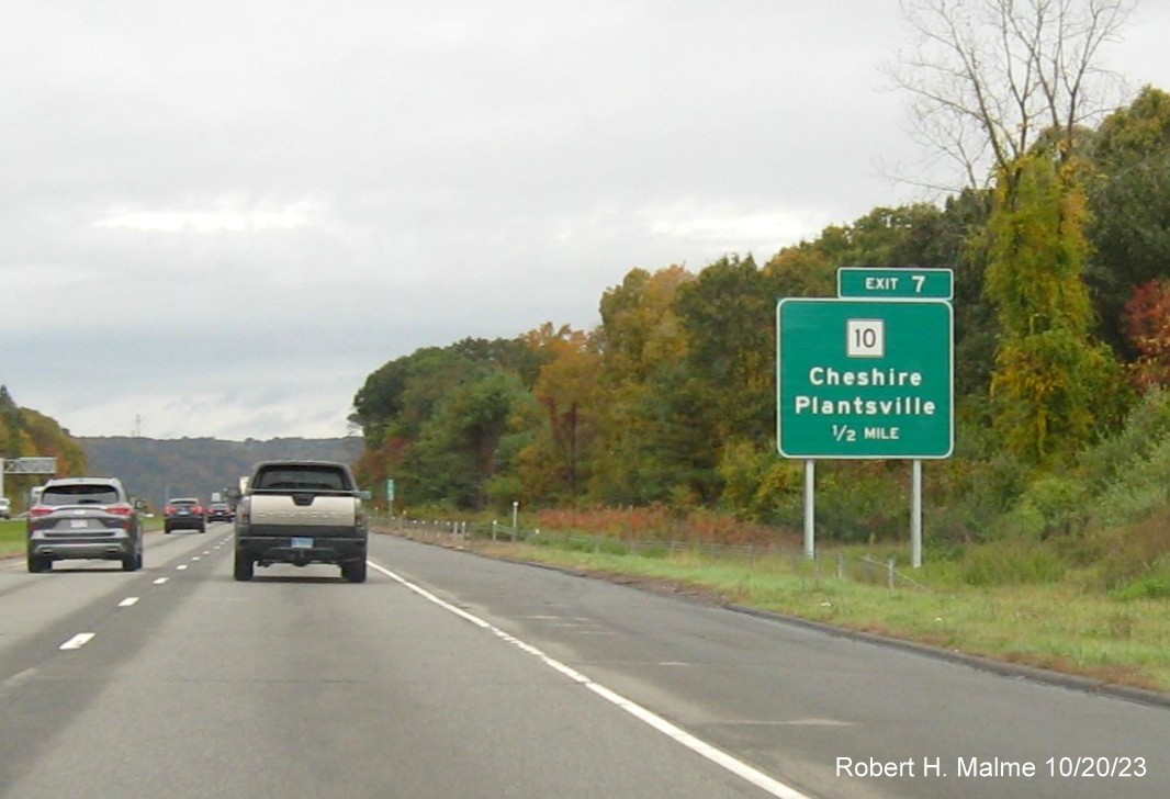 Image of new advance sign for the CT 10 exit with new milepost based exit number 
         on I-691 West in Cheshire, October 2023