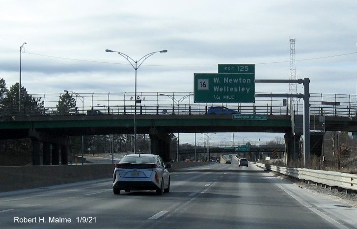 Image of 1/4 Mile advance bridge mounted sign for MA 16 Exit with new milepost based number I-90 West in Newton, January 2021