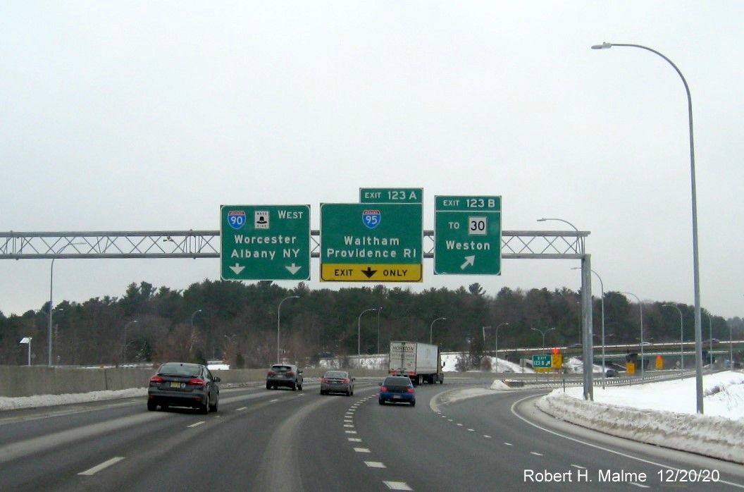 Image of overhead signs at ramp for To MA 30 exit with new milepost based exit numbers on I-90/Mass Pike West in Weston, December 2020