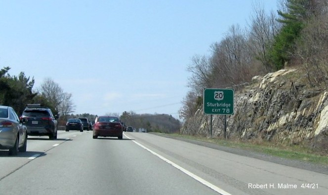 Image of US 20 auxiliary sign for I-84 exit with new milepost based exit number on I-90/Mass Pike West in Charlton, April 2021
