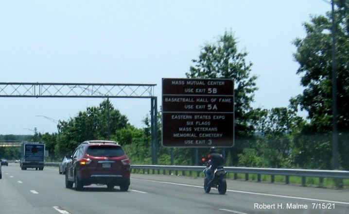 Image of brown auxiliary sign for Hall of Fame and Union Street exits with new milepost based exit numbers on I-91 South in Springfield, July 2021