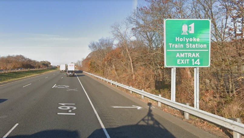 Image of auxiliary sign for US 202 exit with new milepost based exit number on I-91 North in Holyoke, Google Maps Street View image, November 2021