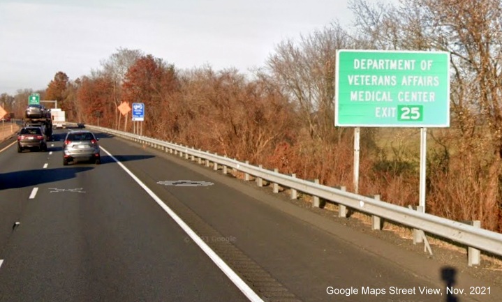 Image of auxiliary sign for MA 9 exit with new milepost based exit number on I-91 North in Amherst, Google Maps Street View image, November 2021