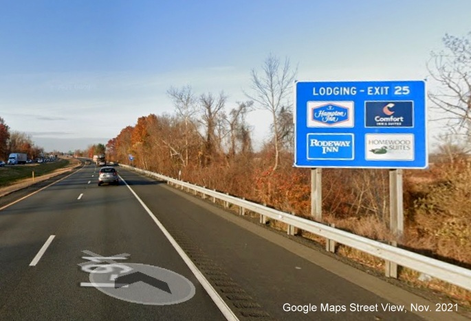 Image of blue services sign for MA 9 exit with new milepost based exit number on I-91 North in Amherst, Google Maps Street View image, November 2021