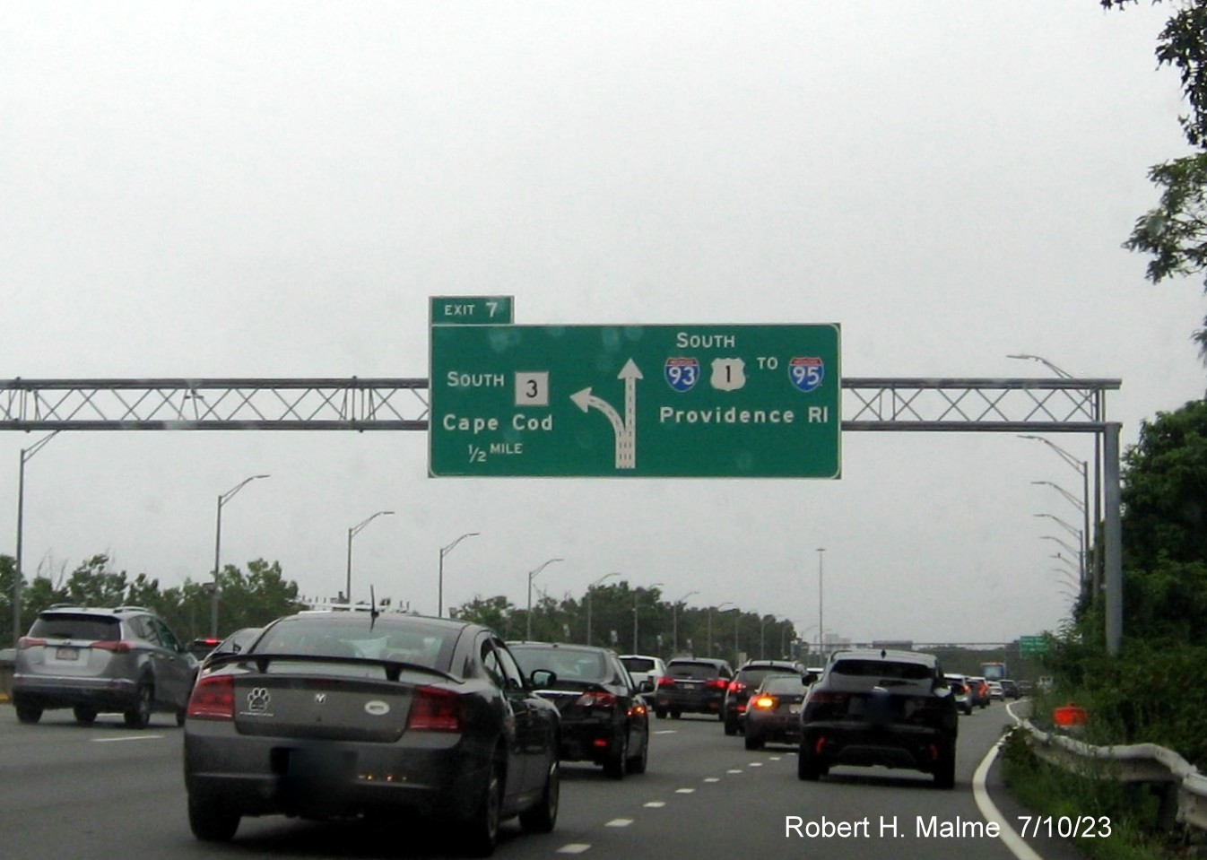 Image of 1/2 Mile advance diagrammatic sign for MA 3 exit with yellow Left Exit tab removed on I-93 South in Quincy, July 2023