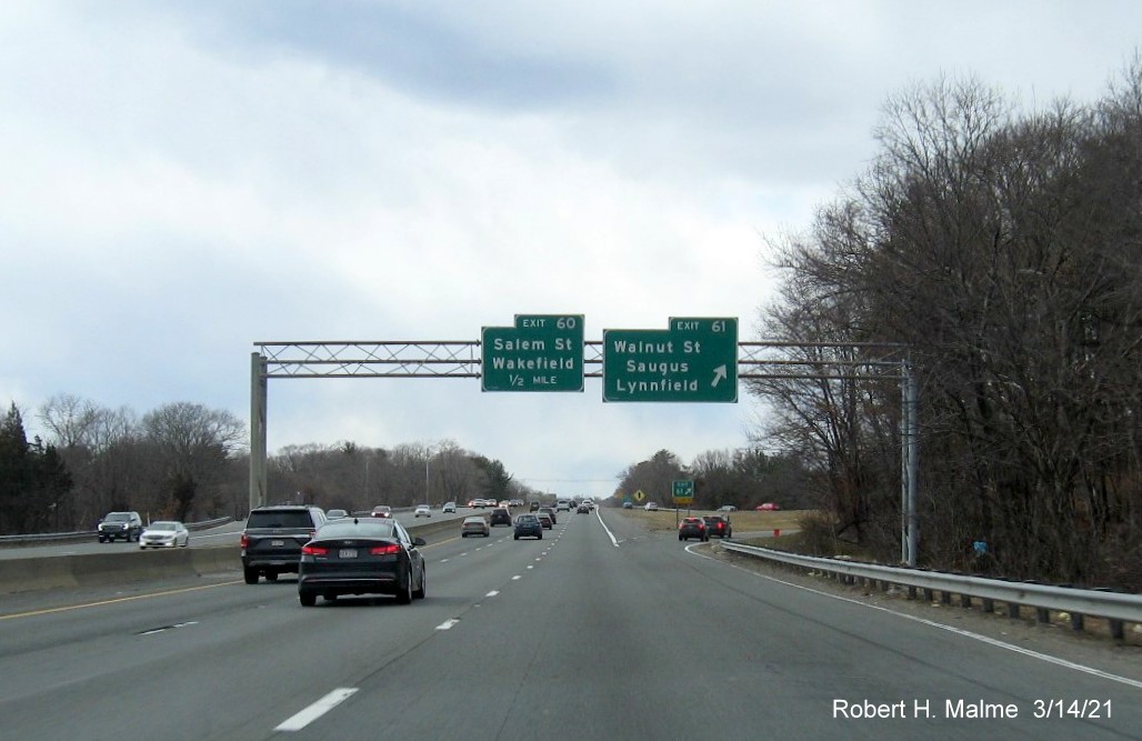 Image of overhead signage at ramp for Main Street exit with new milepost based exit numbers on I-95 South in Lynnfield, March 2021