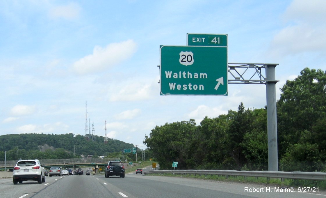 Image of 1/2 Mile advance overhead sign for US 20 exit with new milepost based exit number on I-95/MA 128 North in Waltham, June 2021