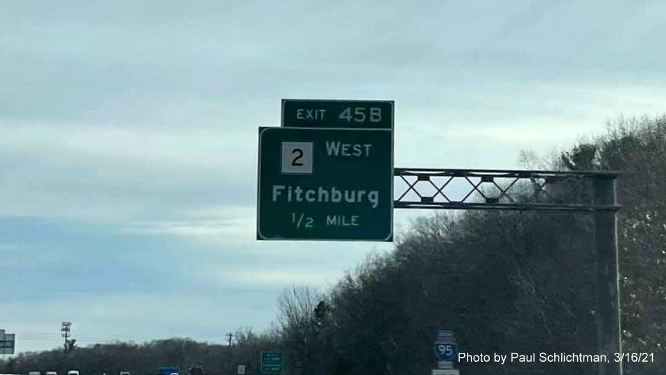 Image of 1/2 Mile advance overhead sign for MA 2 West exit with new milepost based exit number on I-95/MA 128 South in Lexington, photo by Paul Schlictman, March 2021