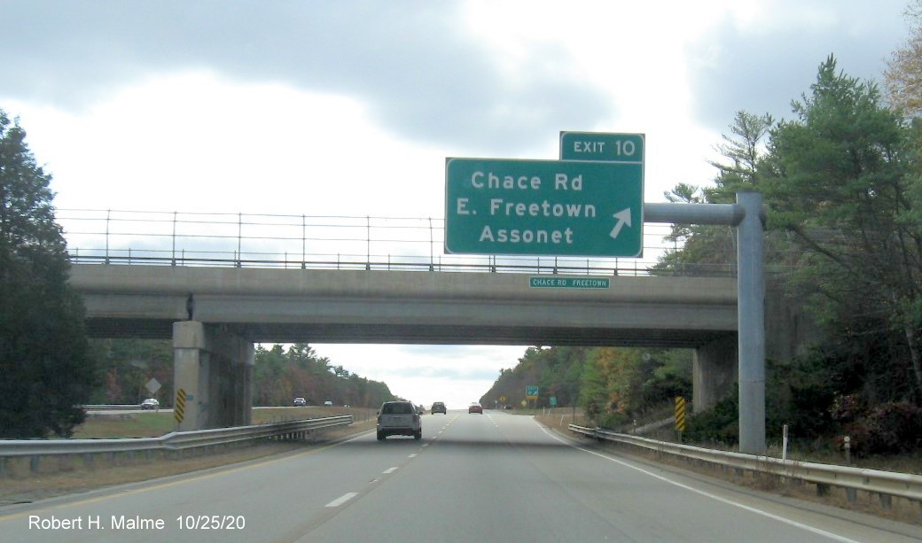 Image of overhead ramp sign with new milepost based exit number with new numbered gore sign beyond for Chace Road exit on MA 140 South in Freetown, October 2020