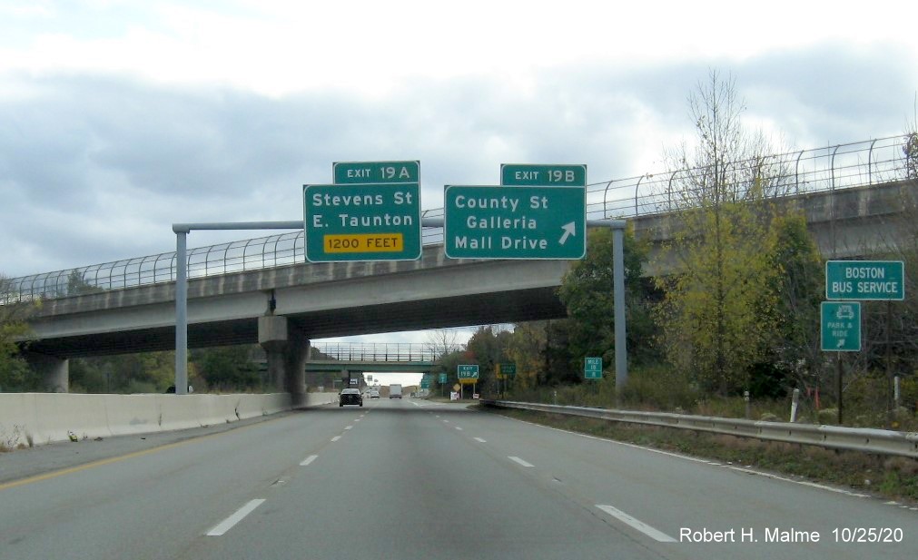 Overhead signs at ramp to County Road with new milepost exit numbers on MA 140 South in Taunton, October 2020