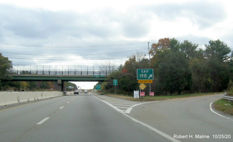 Image of gore sign for County Road exit with new milepost based exit number and yellow old exit number tab below on MA 140 South in Taunton, October 2020
