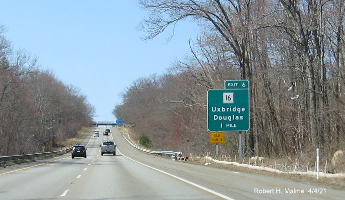 Image of 1 Mile advance sign for MA 16 exit with new milepost based exit number and yellow Old Exit 3 sign on left support on MA 146 North in Uxbridge, April 2021