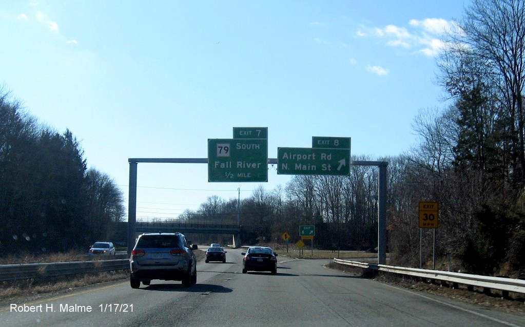 Image of overhead ramp sign for Airport Road/North Main Street exit with new milepost based exit number on MA 24 South in Fall River, January 2021