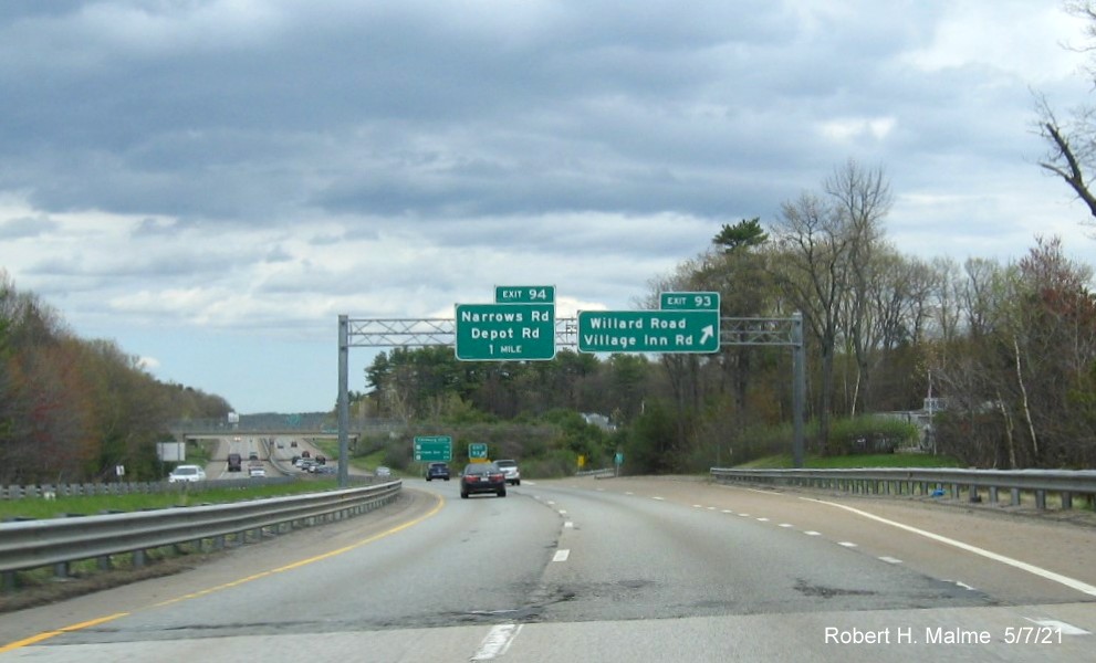 Image of overhead ramp sign for Willard Road/Village Inn Road exit with new milepost base exit number on MA 2 East in Fitchburg, May 2021
