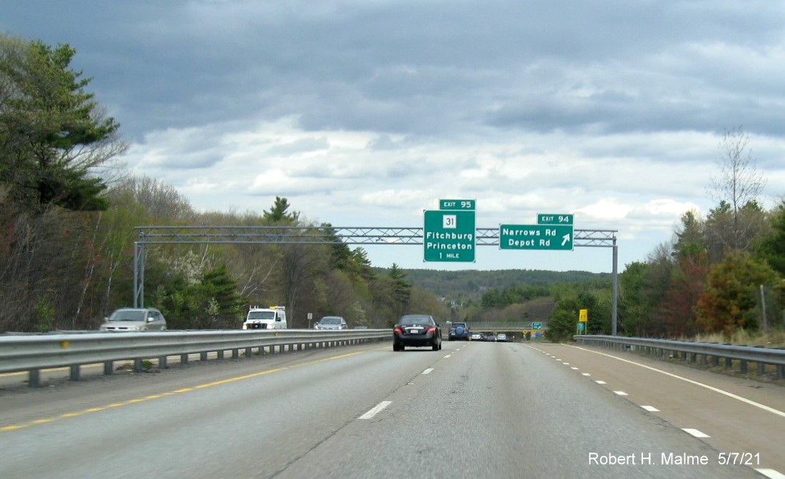 Image of overhead signage at ramp for Narrows Road/Depot Road exit with new milepost based exit number on MA 2 East in Fitchburg, May 2021