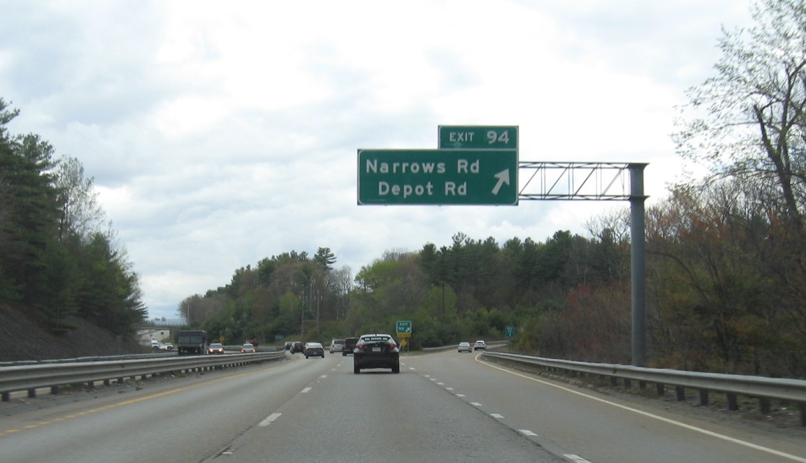 Image of overhead ramp sign for Narrows Road/Depot Road exit with new milepost based exit number on MA 2 West in Fitchburg, May 2021