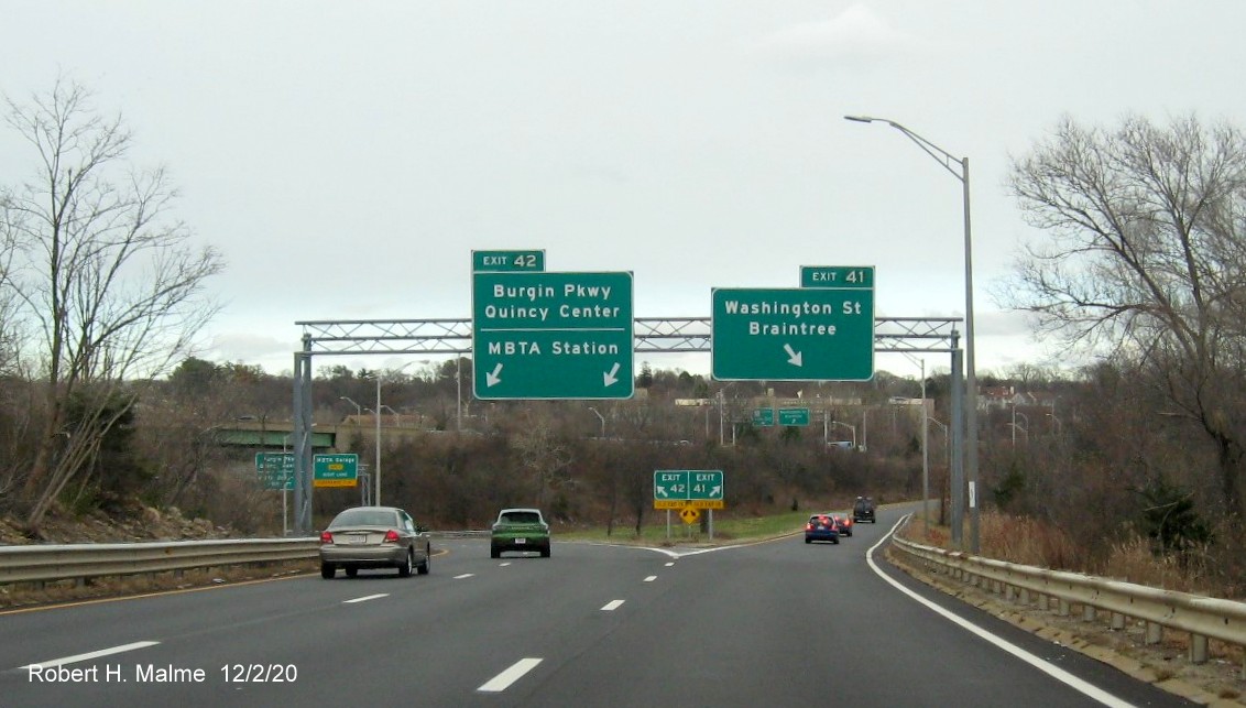 Image of overhead signs on ramp from MA 3 South and I-93/US 1 North for Burgin Parkway/Washington Street exits with new milepost exit numbers on MA 3 South in Braintree, December 2020
