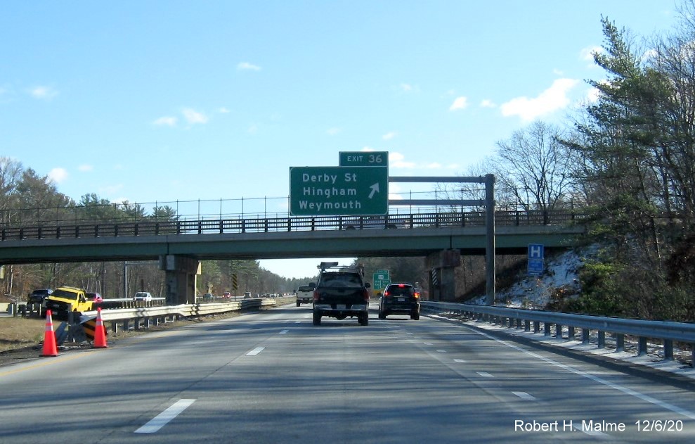 Image of overhead ramp sign for Derby Street exit with new milepost based exit number on MA 3 South in Hingham, December 2020