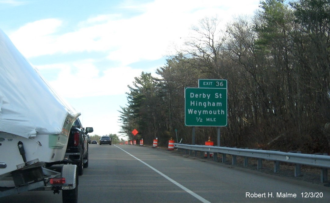 Image of ground mounted 1/2 mile advance sign for Derby Street exit with new milepost based exit number on MA 3 South in Weymouth, December 2020
