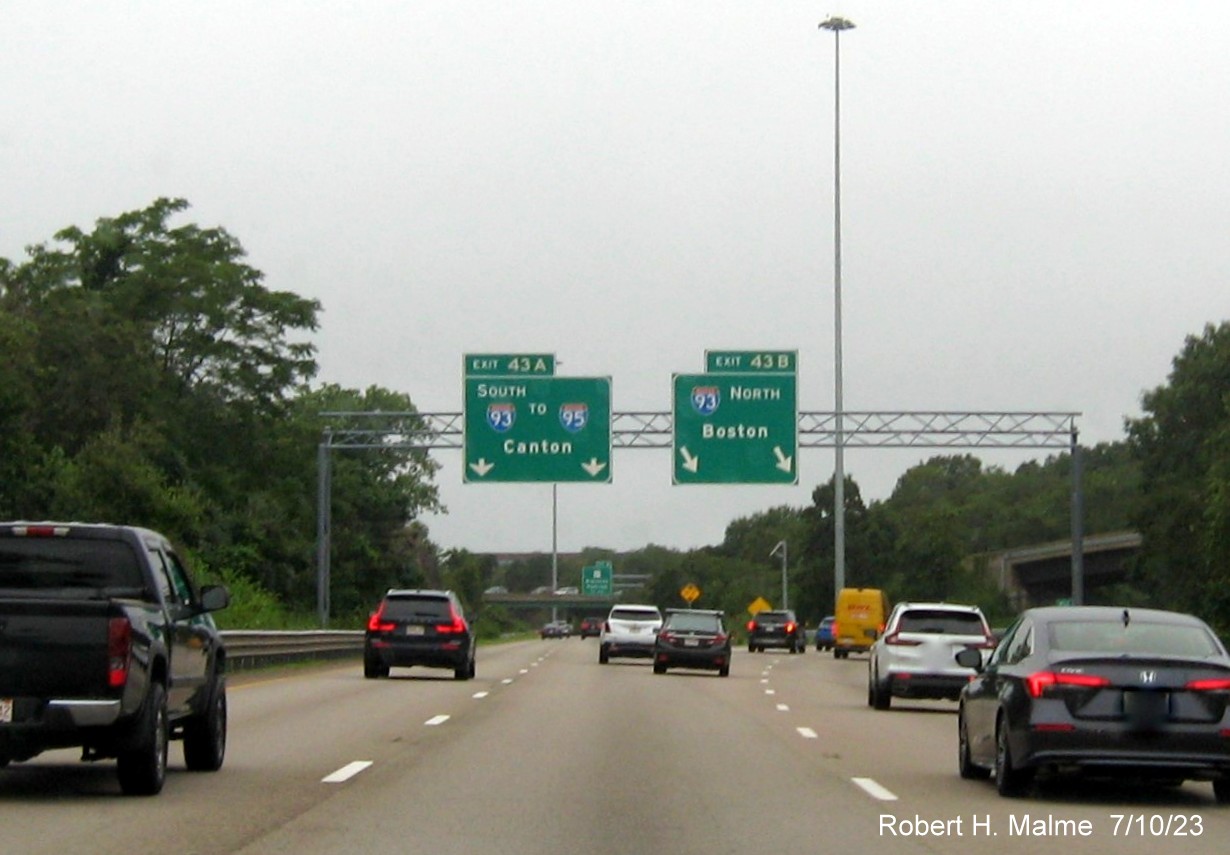 Image of overhead ramp signs for I-93 exits with yellow Left Exit tab missing on MA 3 North in Braintree, July 2023