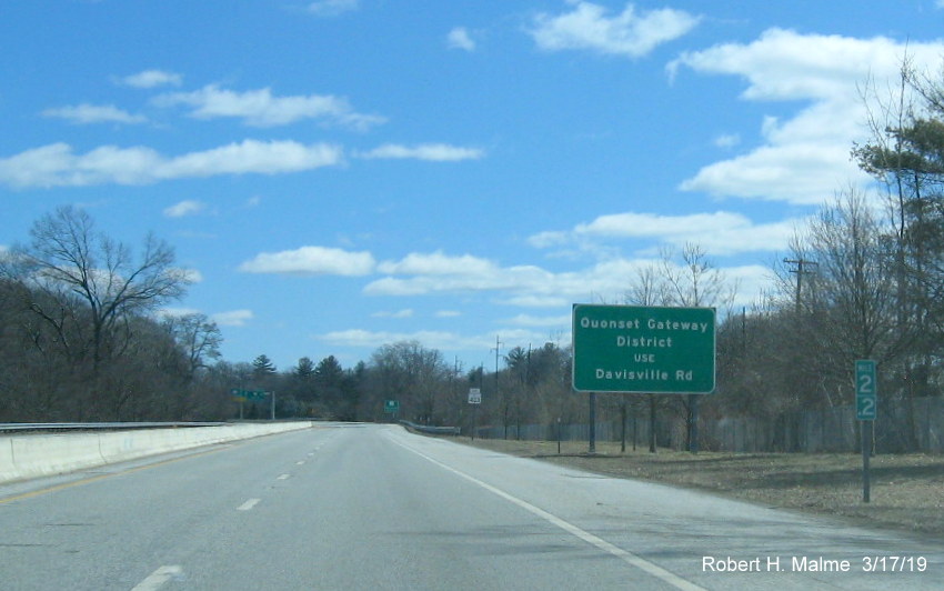 Image of auxiliary sign with new exit number for Davisville Road exit on RI 403 East in Davisville