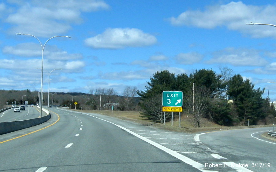 Image of new gore sign with new exit number and old exit number tab for RI 2/RI 102 exit on RI 4 North in Exeter