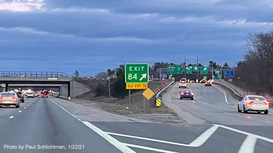 Image of gore sign for MA 4 exit with new milepost based exit number and yellow old exit number sign below on US 3 South in Chelmsford, by Paul Schlichtman, January 2021