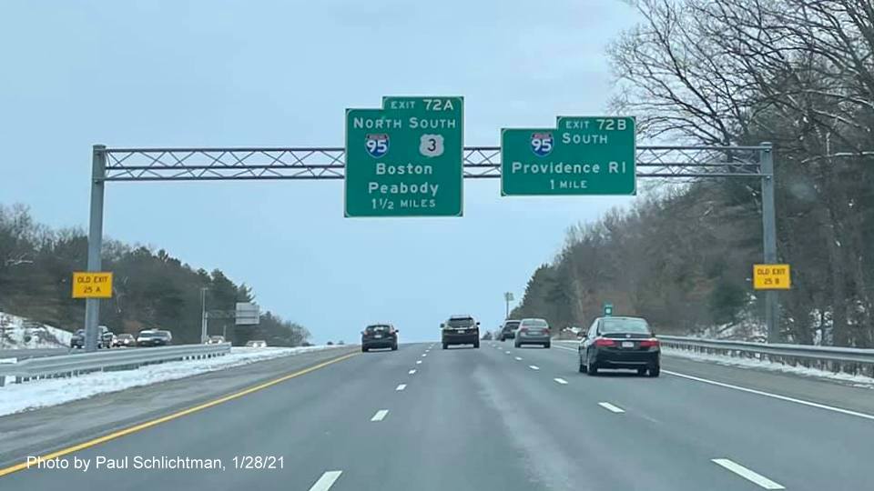 Image of 1 1/2 and 1 mile advance overhead signs for I-95 exits with new milepost based exit numbers and yellow old exit number signs on support posts on US 3 South in Burlington, by Paul Schlichtman, January 2021