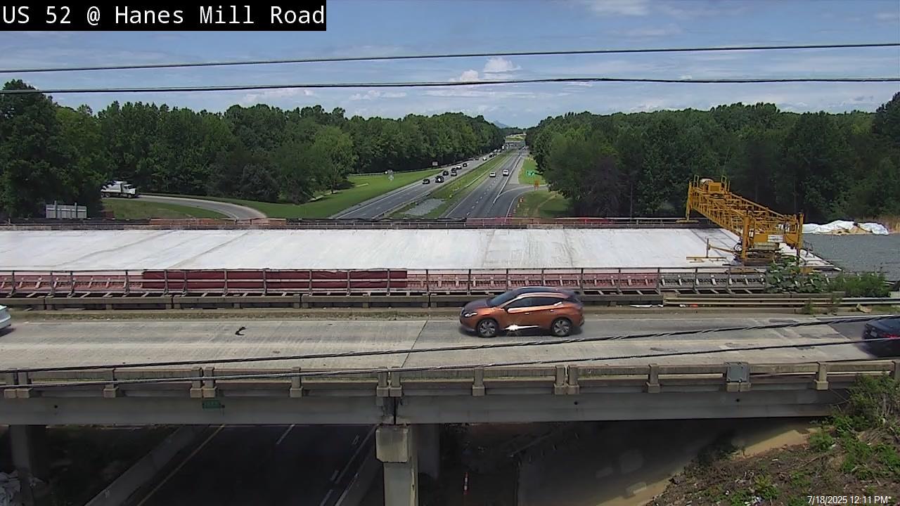 Image of new Hanes Mill Road bridge being constructed over US 52
(Future I-285) by NCDOT traffic camera, July 2025