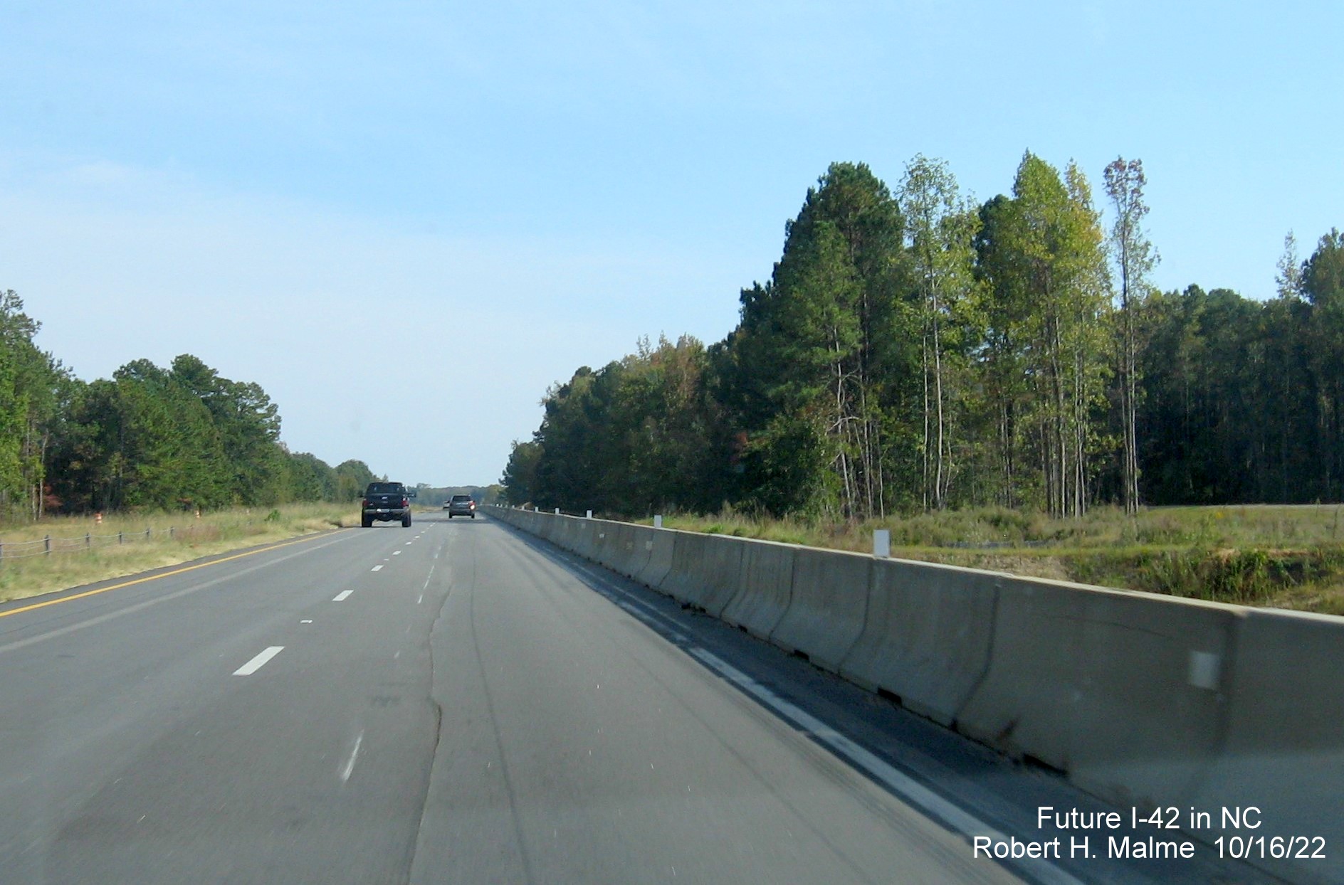 Image of graded new lanes for Future I-42 east along US 70 East in Wilson Mills, October 2022