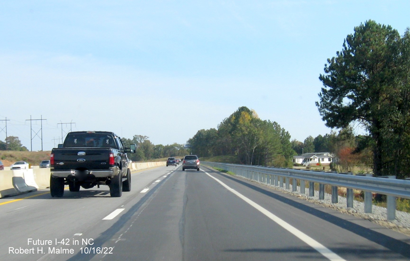 Image of completed future I-42 East shoulder and guardrail after Swift Creek Road on US 70 East in Wilson Mills, October 2022