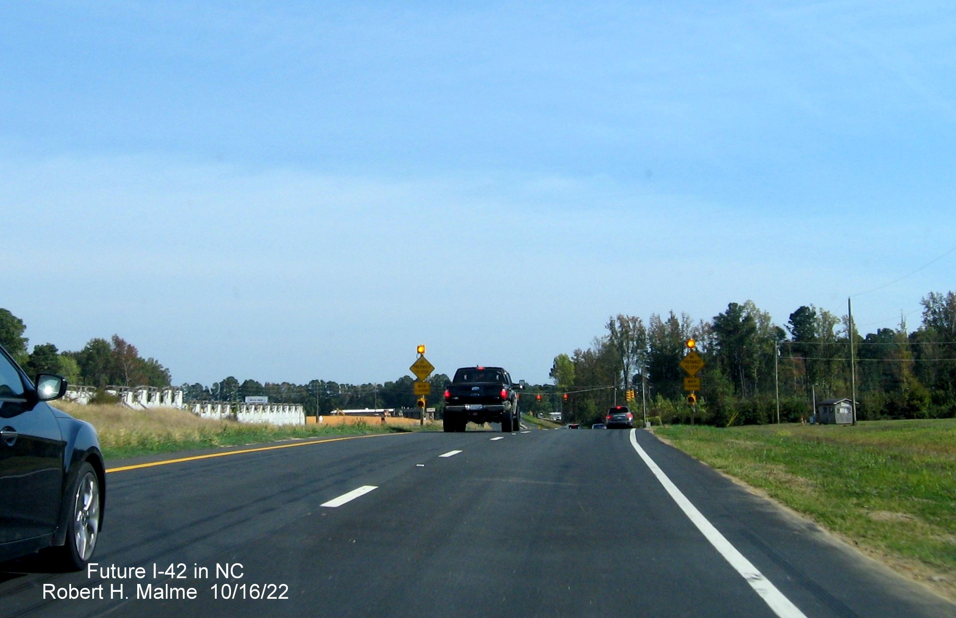 Image of completed future I-42 East right lanes and shoulder approaching Wilson Mills Road in Wilson Mills, October 2022