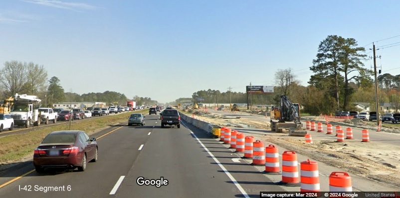 Image of traffic along US 70 East in James City near Grantham Road in improvement project construction 
       zone, Google Maps Street View, March 2024