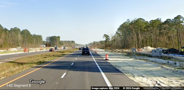 Image of shoulder work along US 70 (Future I-42) East in James City prior to Taberna Way in 
       improvement project construction zone, Google Maps Street View, March 2024