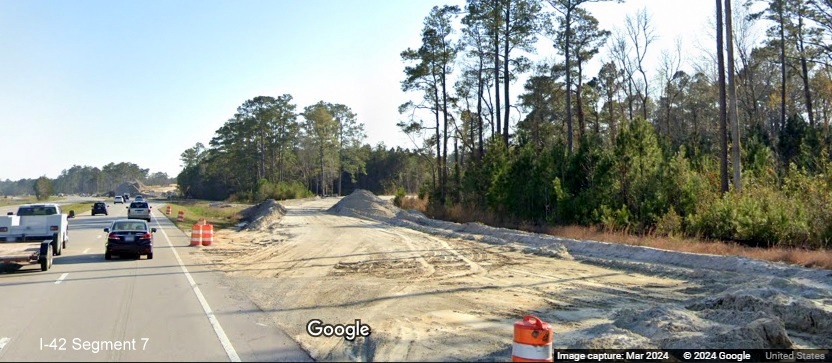 Image of partially graded future ramp to Havelock Bypass (Future I-42) east from US 70 East, Google Maps Street View image, March 2024
