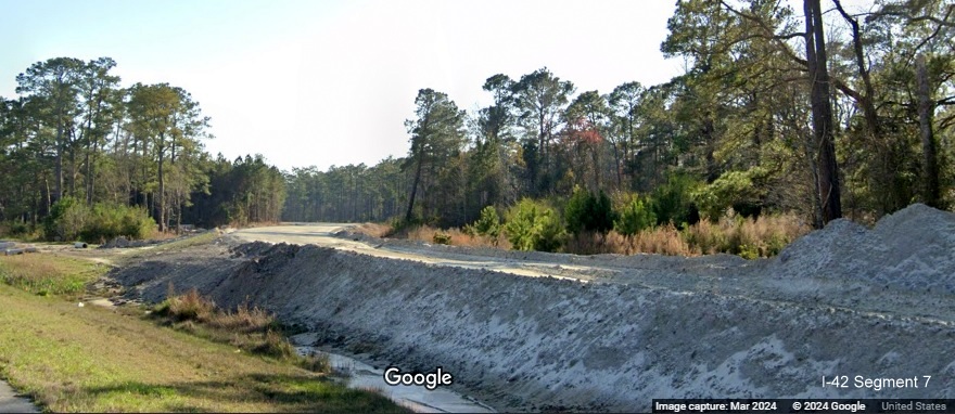 Image of graded future ramp to Havelock Bypass (Future I-42) east from US 70 East, Google Maps Street View image, March 2024