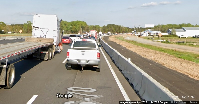 Image of construction along US 70 (Future I-42) East approaching Uzzle Industrial Drive in Clayton, Google Maps Street View, April 2023