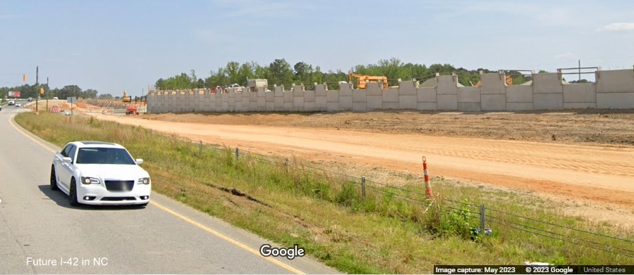 Image of construction of future I-42 West bridge over Wilson's Mills Road in US 70 West, Google Maps  Street View, May 2023