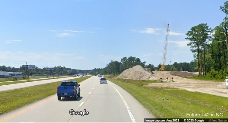 Image of US 70 East lanes approaching site of future ramp at western end of Havelock Bypass (Future I-42), Google Maps Street View, August 2023