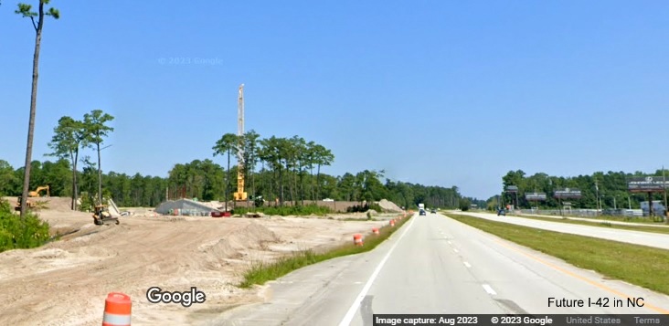 Image of future US 70 East lanes along side current US 70 East lanes at western end of Havelock Bypass (Future I-42), Google Maps Street View, August 2023