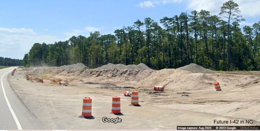 Image of future US 70 East lanes meeting the eastern end of Havelock Bypass (Future I-42), Google Maps Street View, August 2023