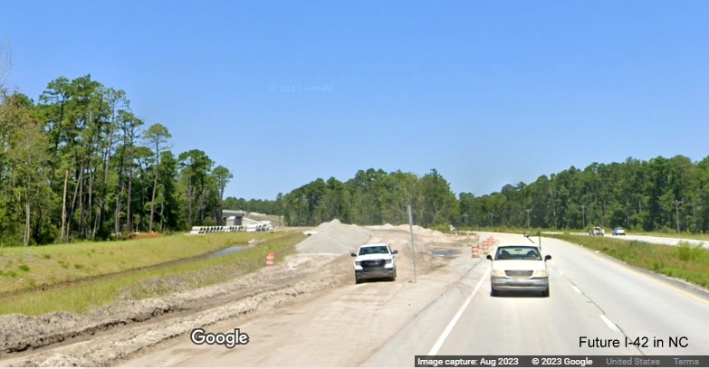 Image of future US 70 East lanes meeting he eastern end of Havelock Bypass (Future I-42), Google Maps Street View, August 2023