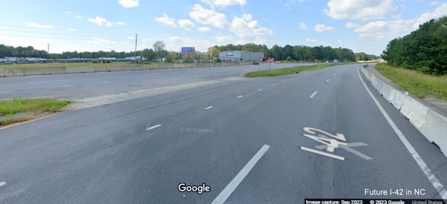 Image of open median along US 70 (Future I-42) West in Johnston County at the former Sadisco
     Road intersection at the end of the project work zone in Clayton, Google Maps Street View, September 2023