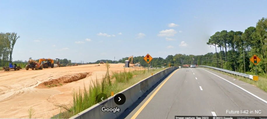 Image of future I-42 lanes being built along side prior to Wilson's Mills Road intersection on US 70 (Future I-42) West in Johnston County, Google Maps Street View, September 2023